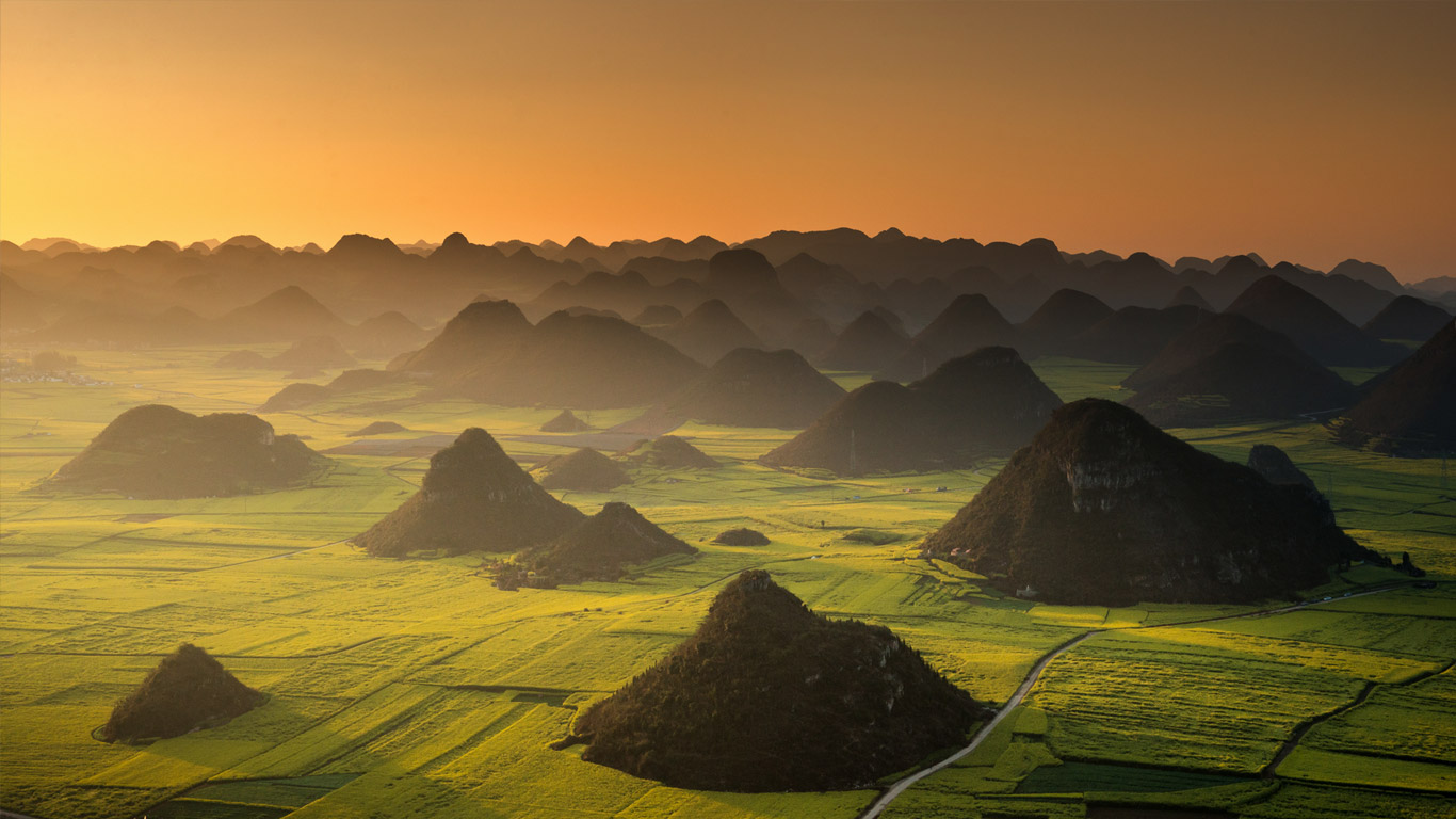云南罗平的清晨(© Nutexzles/Moment/Getty Images) - 2014/07/18 云南罗平的清晨(© Nutexzles/Moment/Getty Images) - 2014/07/18